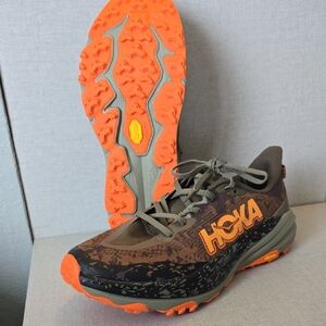 Hoka Speedgoat 6, Orange and Brown Athletic Shoes with Dynamic Silhouette. (m10)